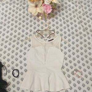 White Peplum Sleeveless Top